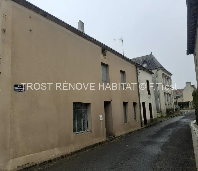 Après : Nettoyage d'une façade de maison à Valanjou