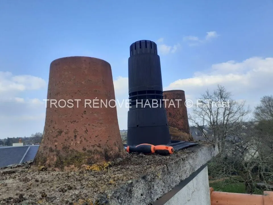 Pose d'un chapeau de cheminée à Angers